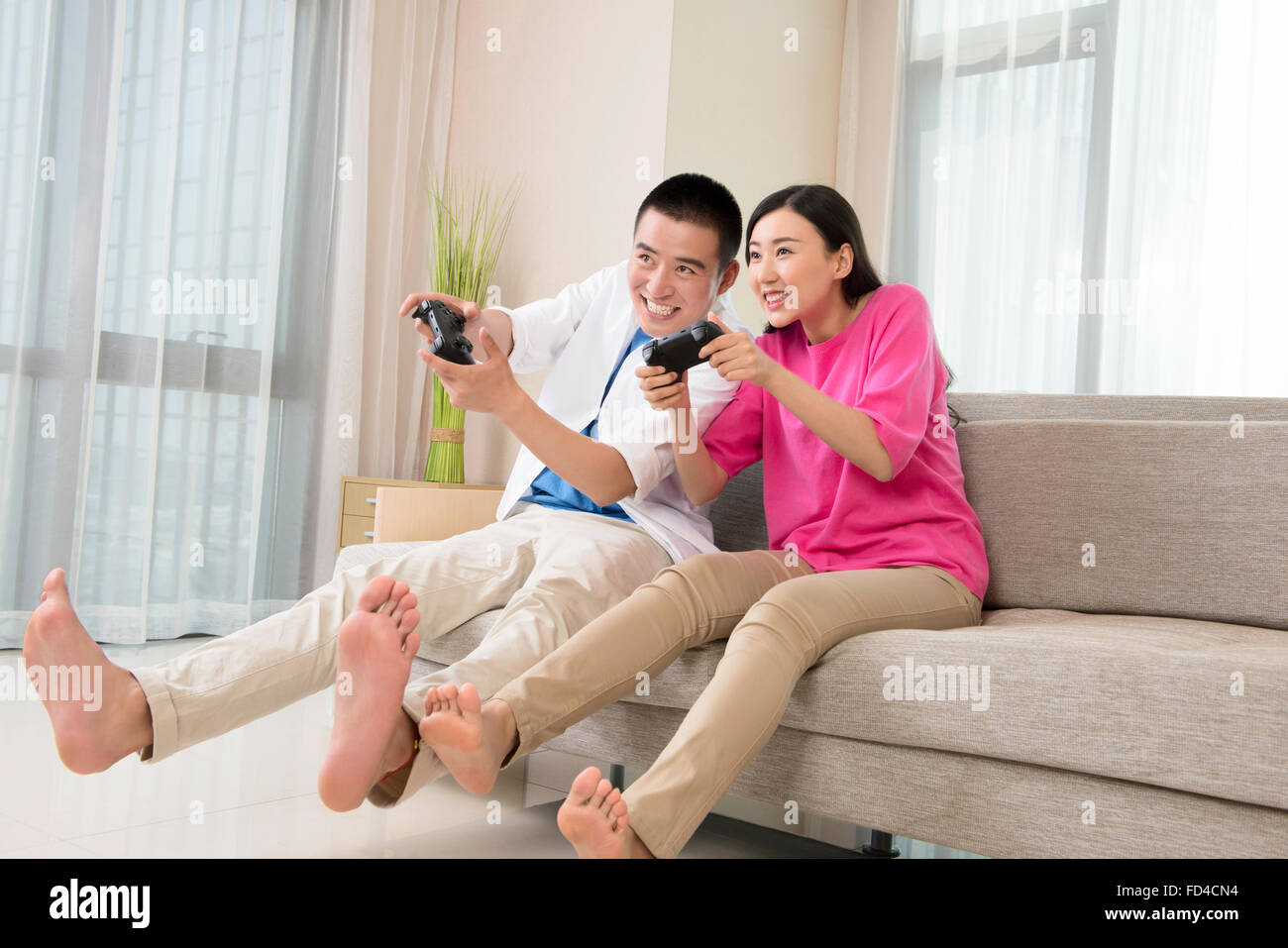 Couple Playing Video Game - Stock Photo - Masterfile - Premium