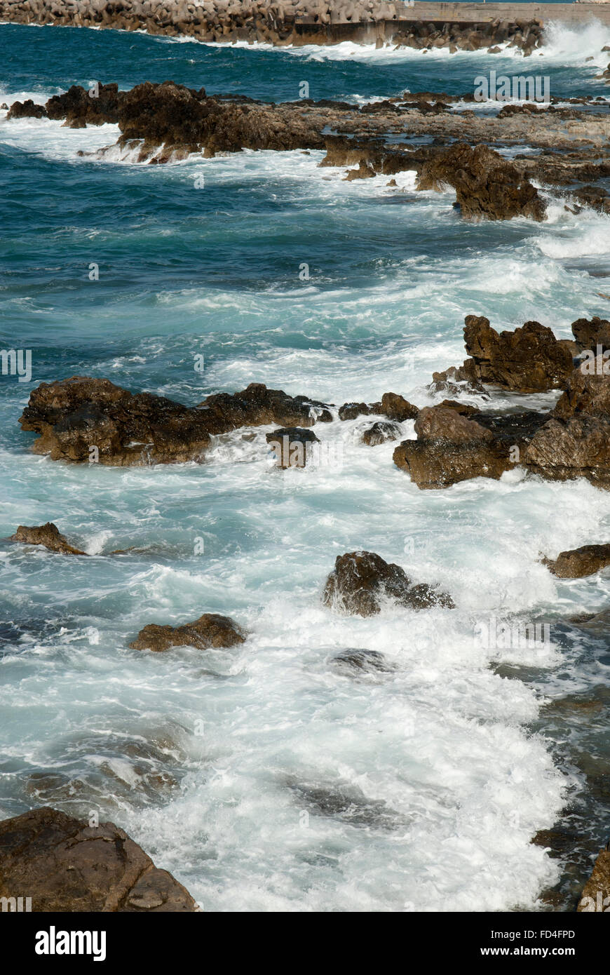 Rough Jagged Rocks in Sea Stock Photo