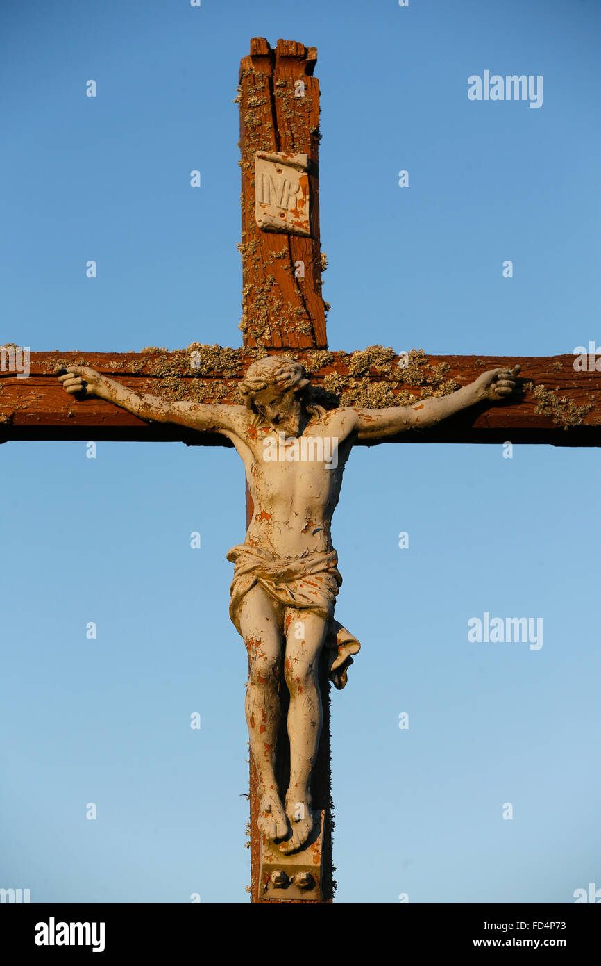 Countryside. Jesus Christ on the cross. Stock Photo