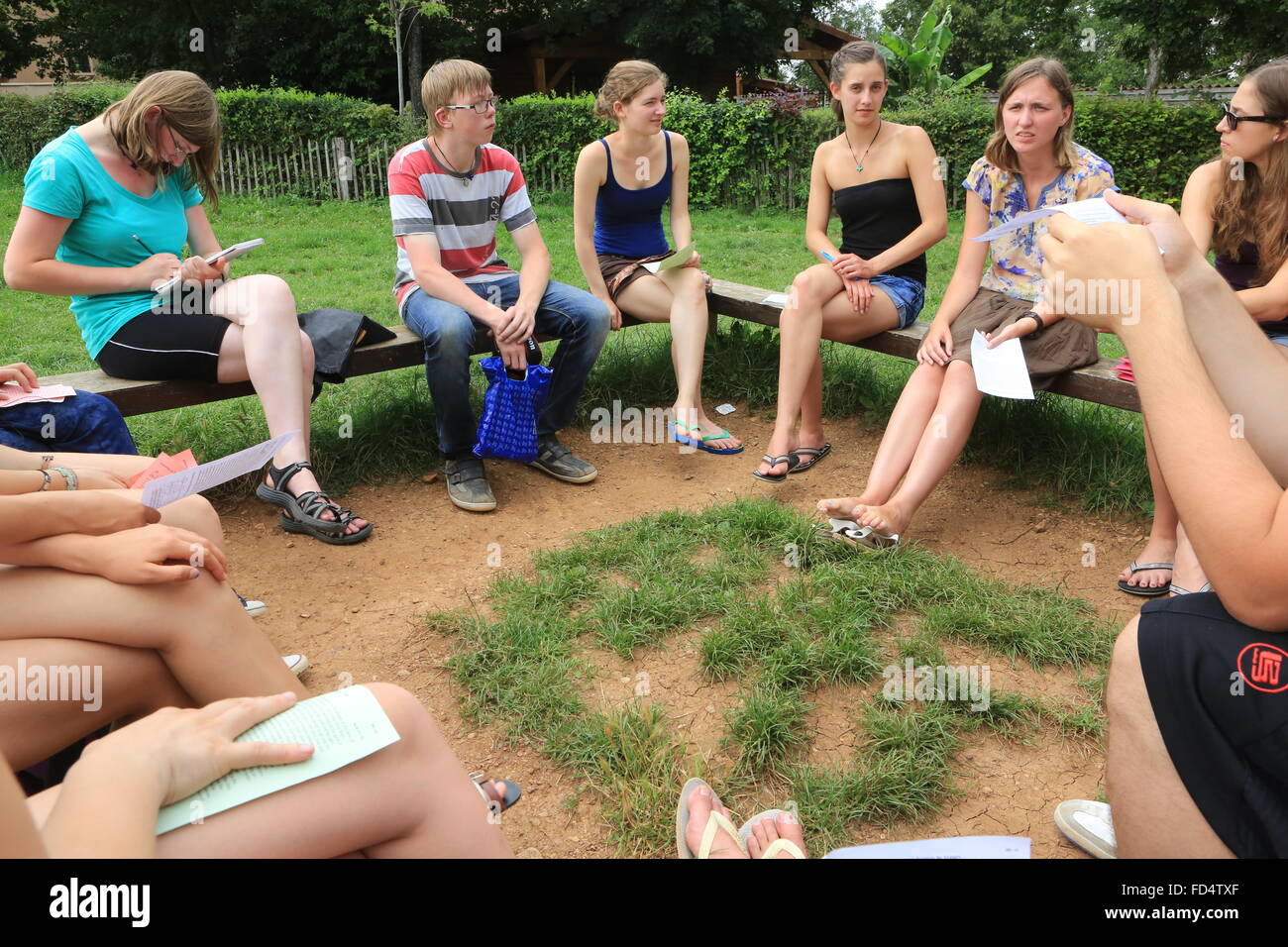 Small discussion group. Taize ecumenical community. Stock Photo