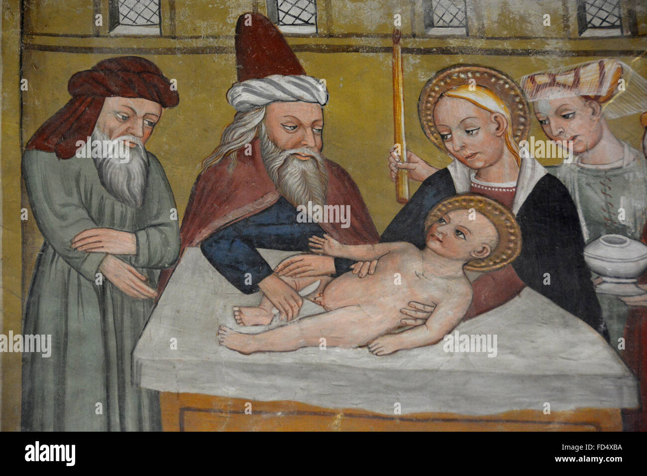 St Antony's chapel in Bessans. 16th century painting depicting Jesus's circumcision. Stock Photo