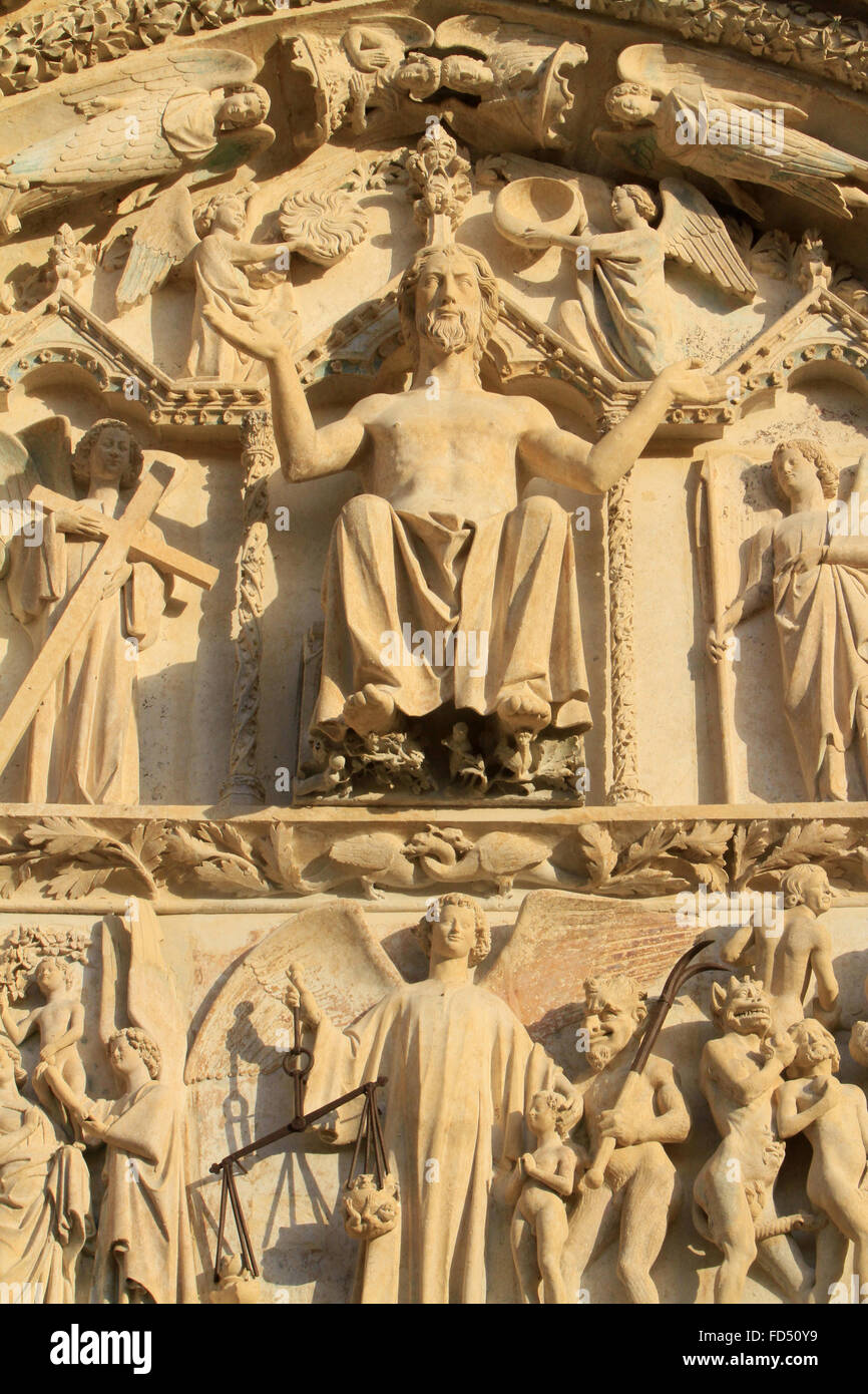 Sculpture of Christ seated on a throne. The Last Judgment. Tympanum of the western central portal. St. Stephen's Cathedral. Stock Photo