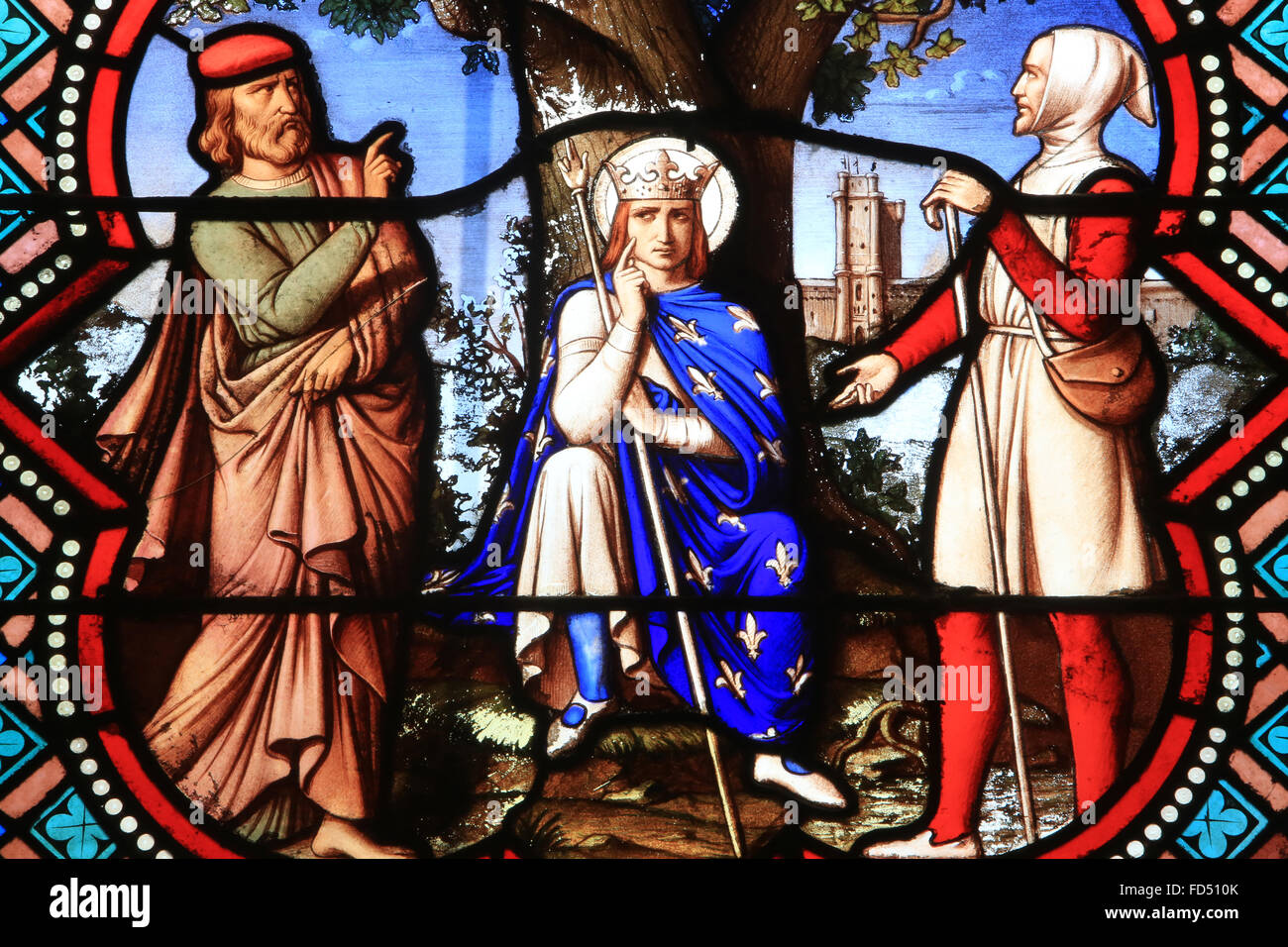 Saint Louis rendering justice under the oak. Detail of stained glass window of Saint Louis by Claudius Lavergne. 1863. Senlis Ca Stock Photo