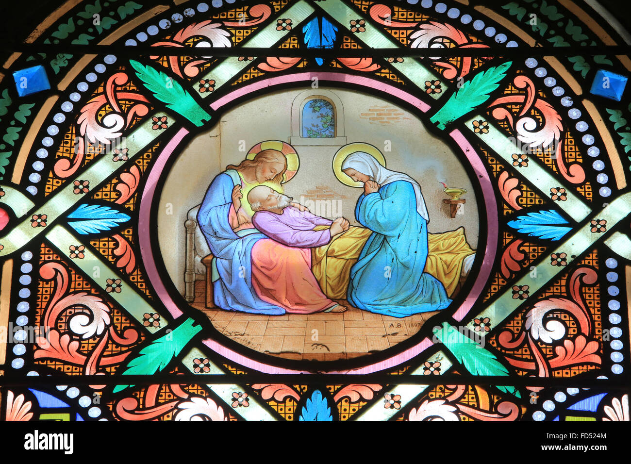 Death of Joseph father of Jesus Christ. Stained glass window. Shrine of