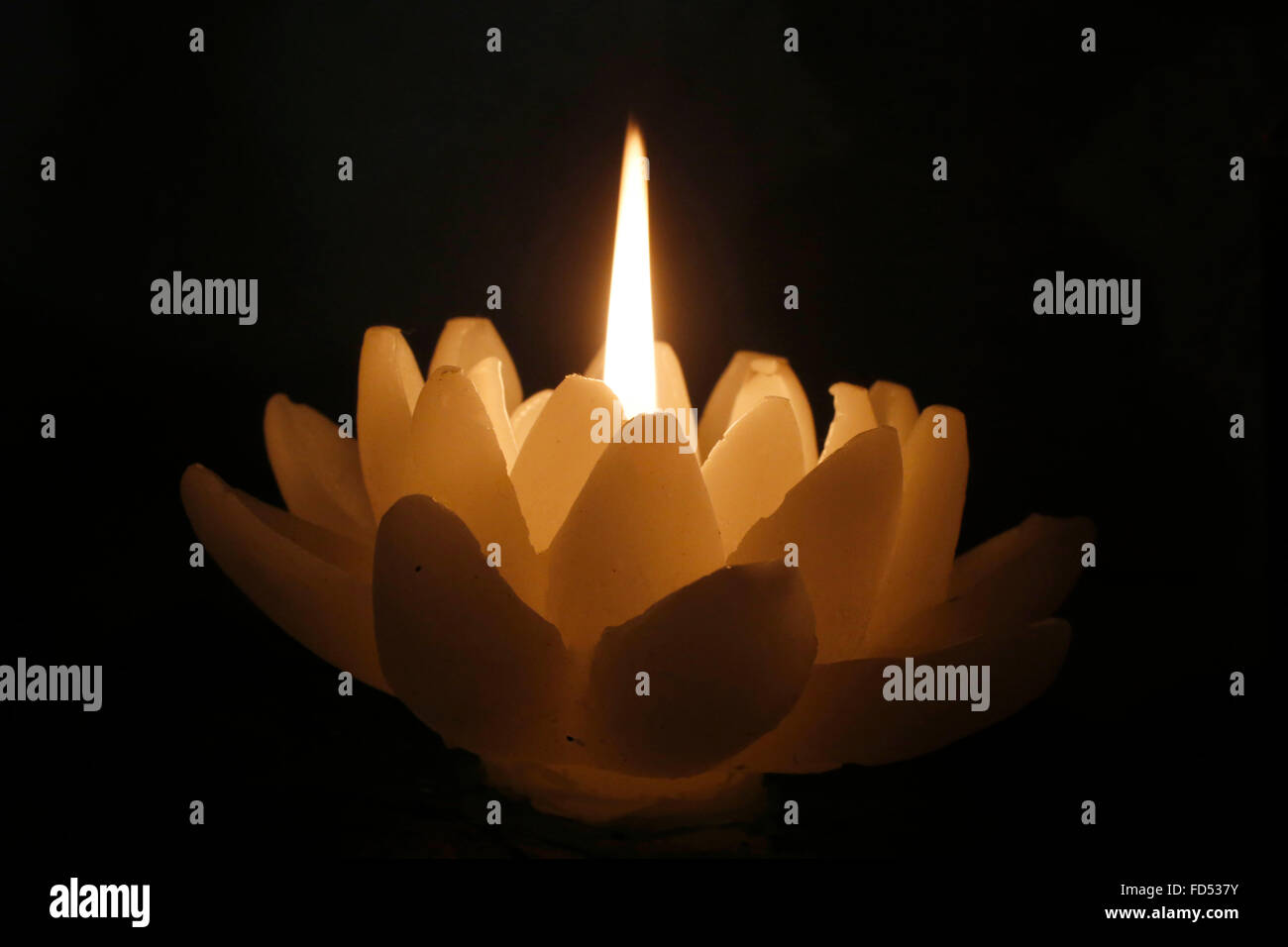 buddhist candle stock photo