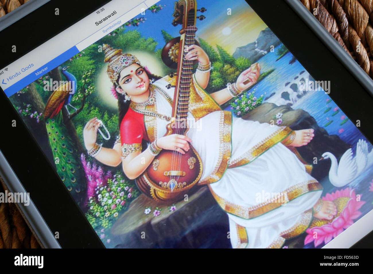 Hindu deity on an Ipad. Saraswati. Stock Photo