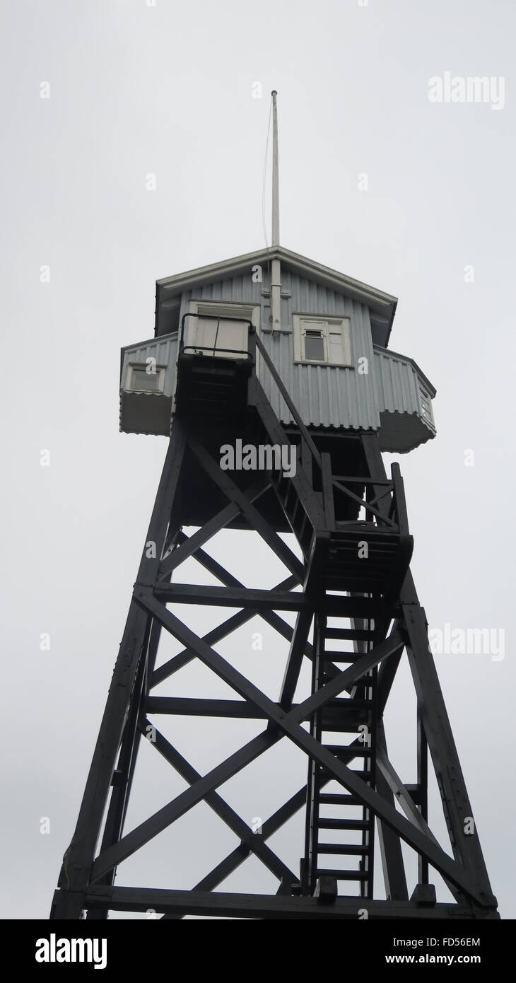 Tall wooden coast guard lookout tower in Dragoer Harbor, Denmark Stock Photo