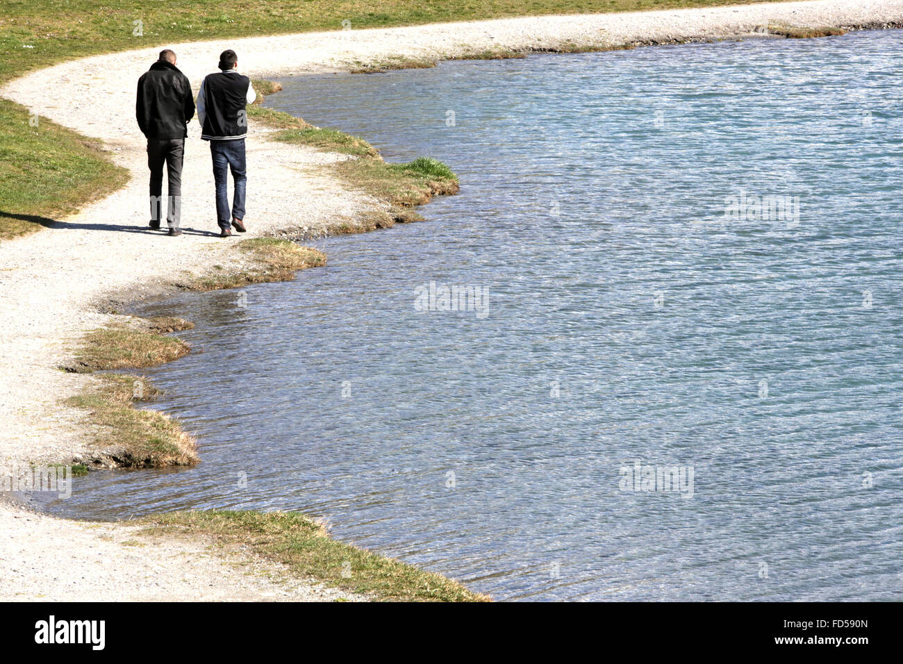 Young teens walking. Leisure center Islands. Lake Passy. Stock Photo