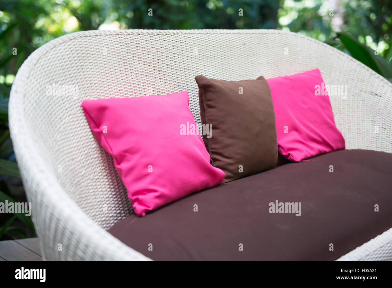 Pink And Brown Cushions On Couch Stock Photo Alamy