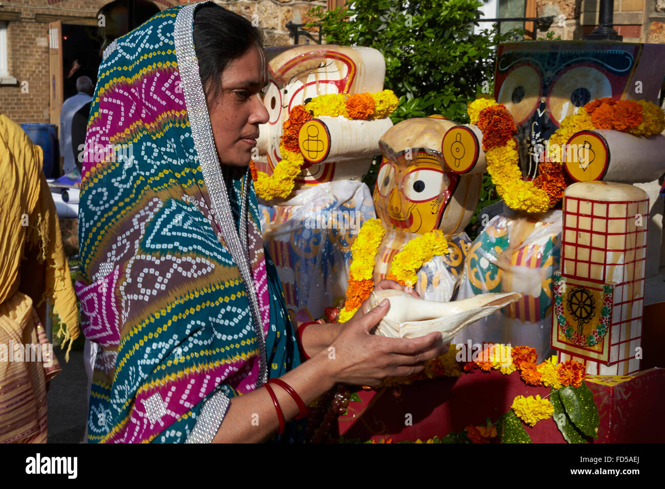 Snaya Yatra festival celebration at ISKCON. Bathing the murti. Stock Photo