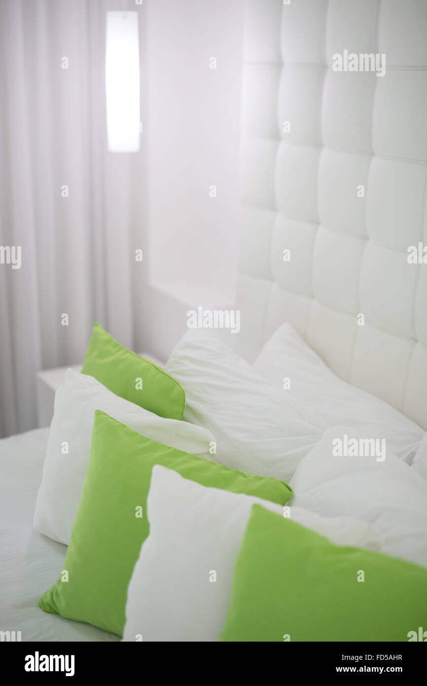 White And Lime Green Pillows Stock Photo