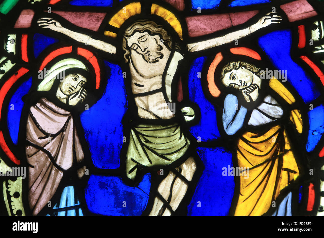 The Crucifixion. Gothic stained glass window from the Dominican Church of Strasbourg (1260). Oeuvre Notre-Dame de Strasbourg Mus Stock Photo