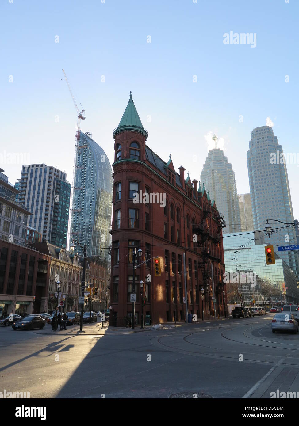 Front street in Toronto (Canada) with the Gooderham building in the foreground and Brookfield Place behind it. Stock Photo
