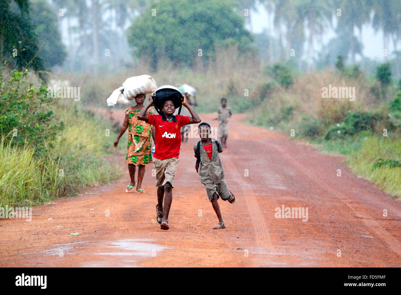 Children under the rain Stock Photo Alamy