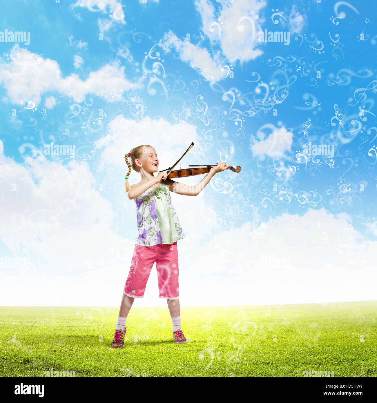 Image of cute girl playing violin outdoors Stock Photo - Alamy