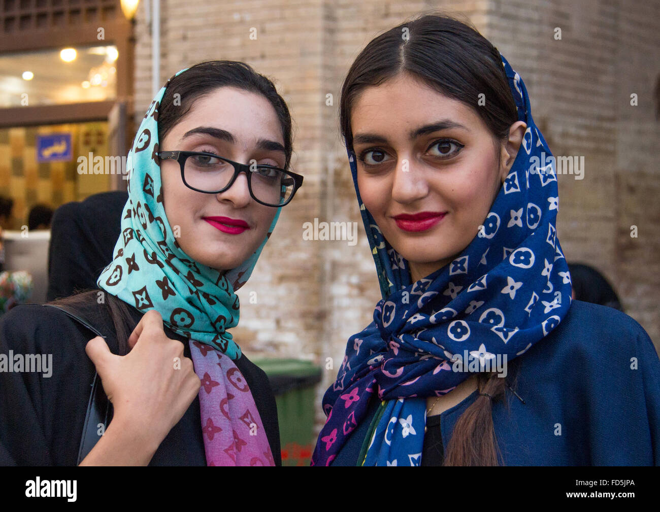 iranian young women with louis vuitton scarves, Central district, Tehran, Iran Stock Photo