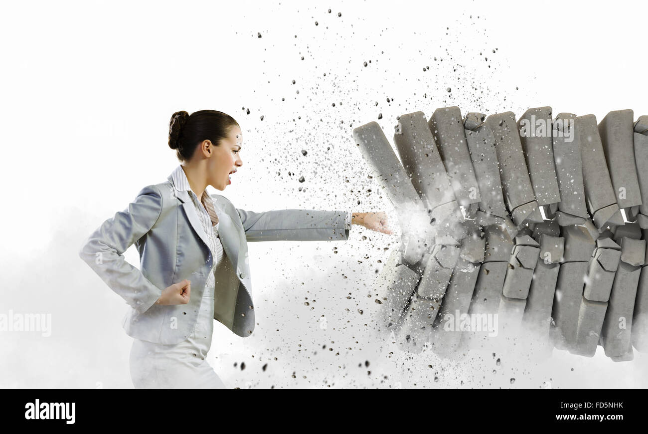 Image of businesswoman breaking bricks with hand Stock Photo Alamy
