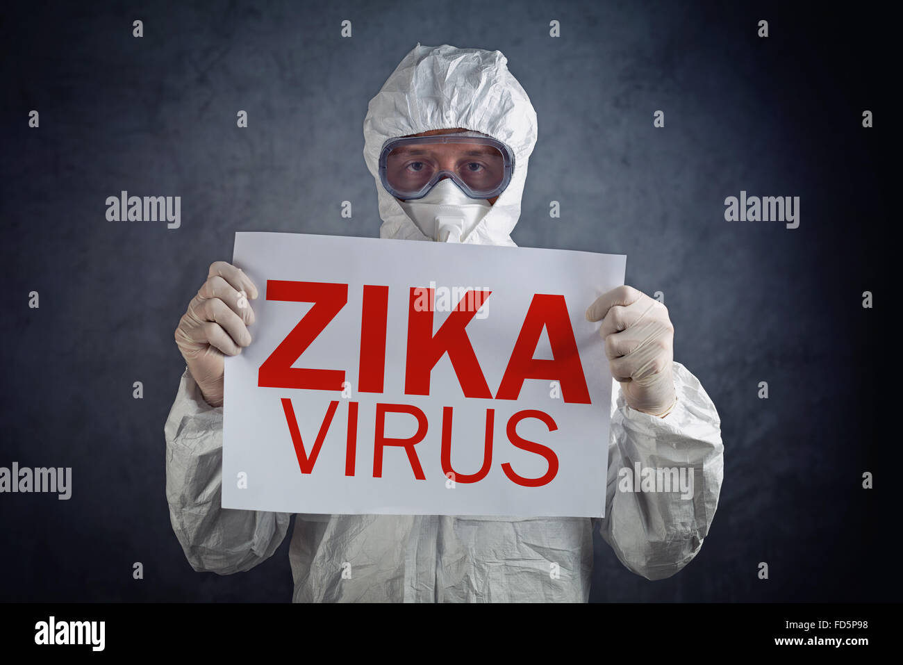 Zika virus concept, medical worker in protective clothes showing alertness poster Stock Photo