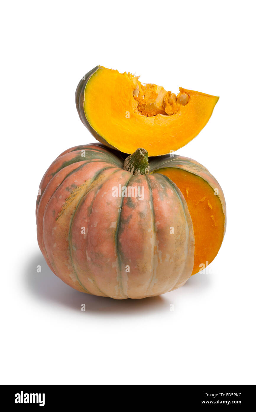 Fresh Speckled hound pumpkin and a piece on white background Stock Photo