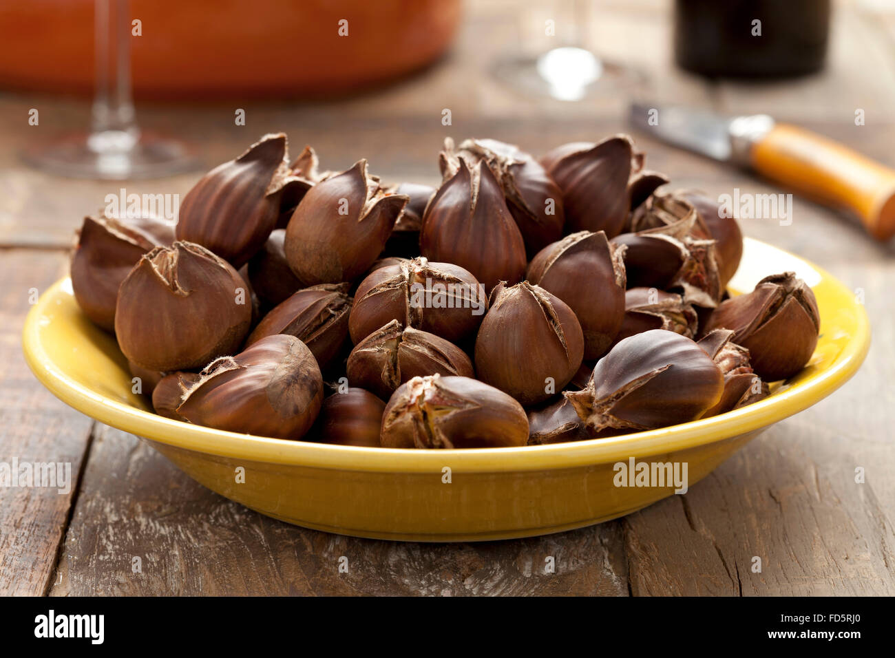 Cooked sweet chestnuts on a dish Stock Photo