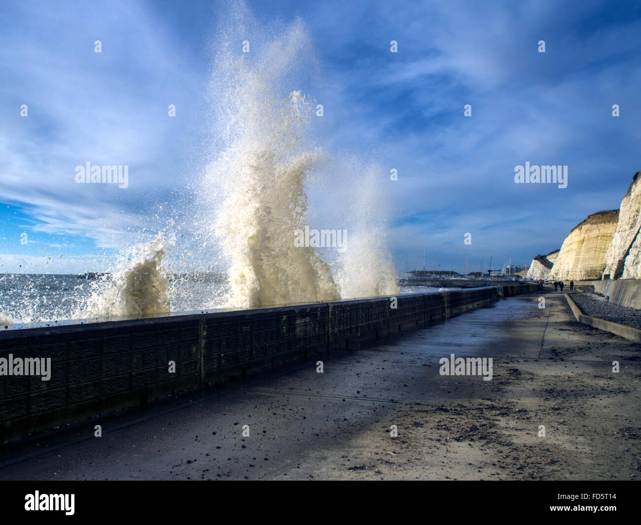 Waves breaking along the Undercliff Walk near Brighton Marina, Sussex, UK Stock Photo