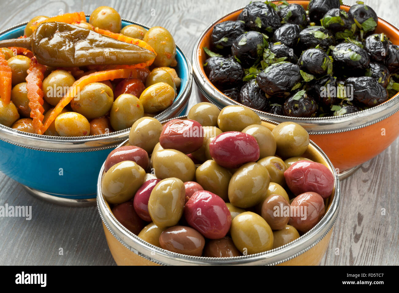 Diversity of Moroccan olives in bowls Stock Photo