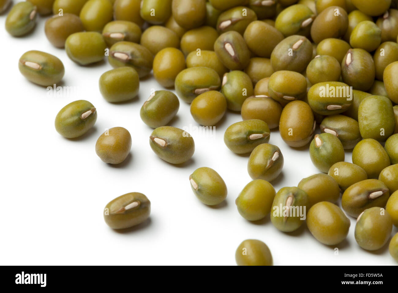 Heap of dried Mung beans on white background Stock Photo