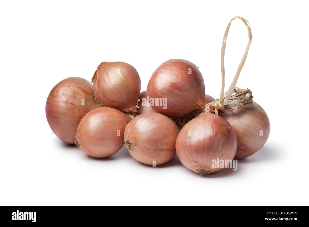 Fresh pink Roscoff onions on white background Stock Photo