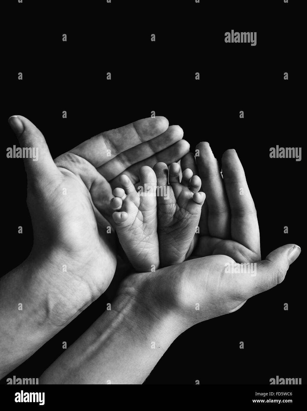 Feet In Hands Hi Res Stock Photography And Images Alamy