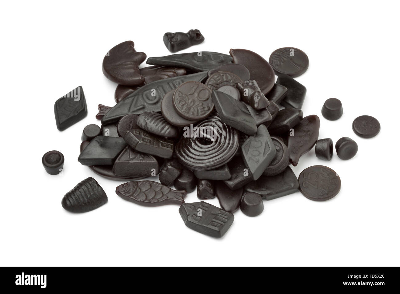 Assorted black and brown liquorice on white background Stock Photo