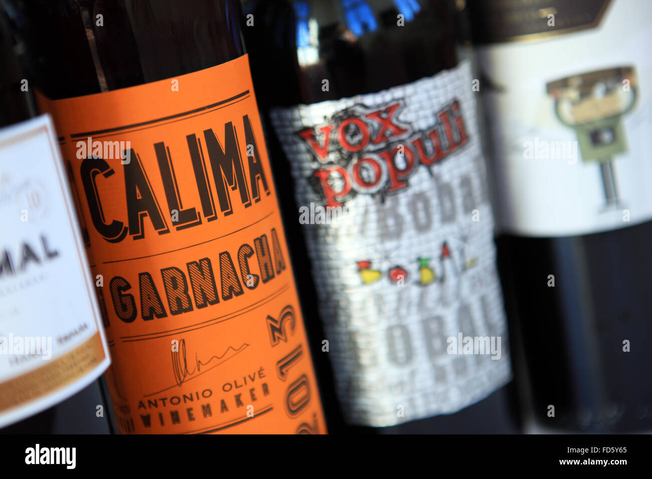 Bottles of red wine with interesting labels Stock Photo Alamy