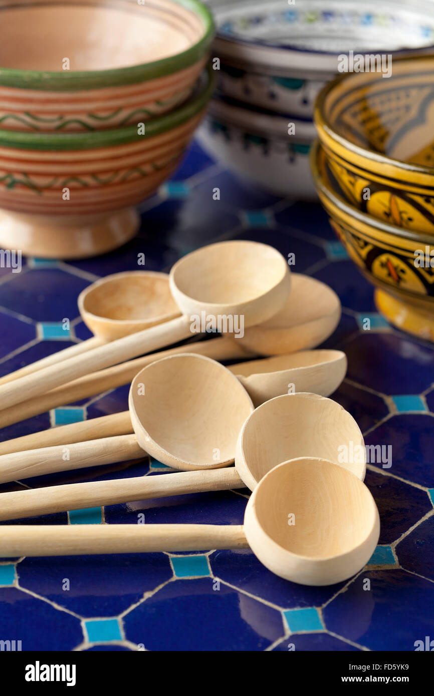 Traditional Moroccan wooden spoons and soup bowls Stock Photo
