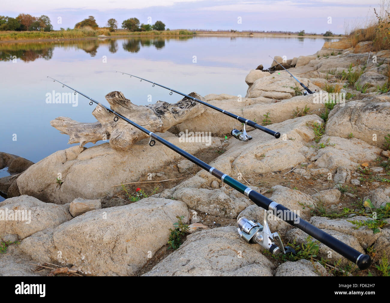 Fishing on the riverside in the evening Stock Photo Alamy