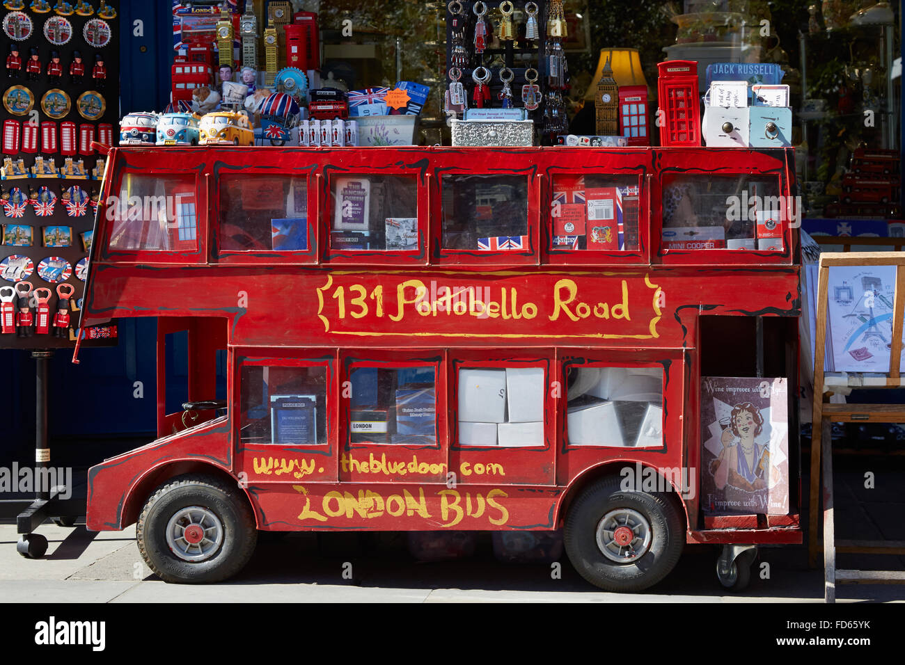 Portobello road souvenir shop with red London bus model in London Stock Photo