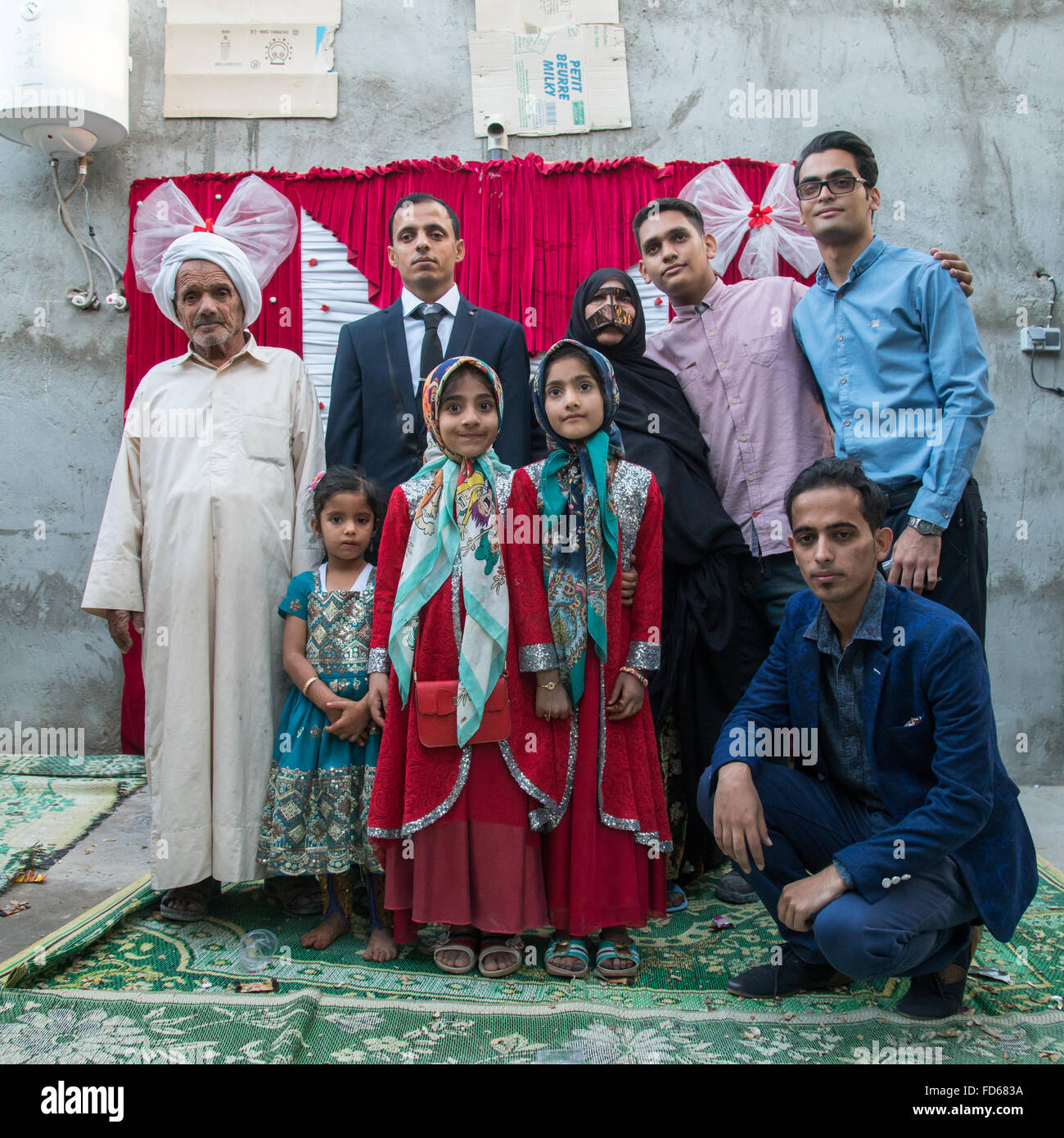 groom posing with his relatives during a wedding ceremony, Qeshm Island, Salakh, Iran Stock Photo