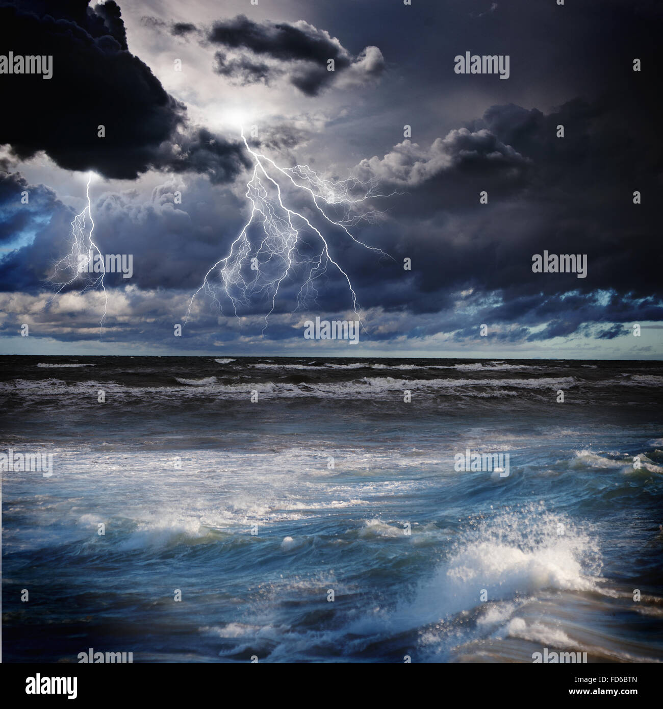 Image of dark night with lightning above stormy sea Stock Photo - Alamy