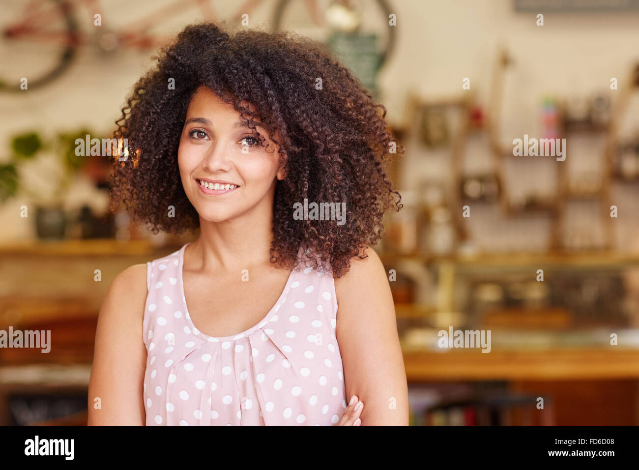 Beautiful Mixed Race Woman Smiling In A Coffee Shop Stock Photo