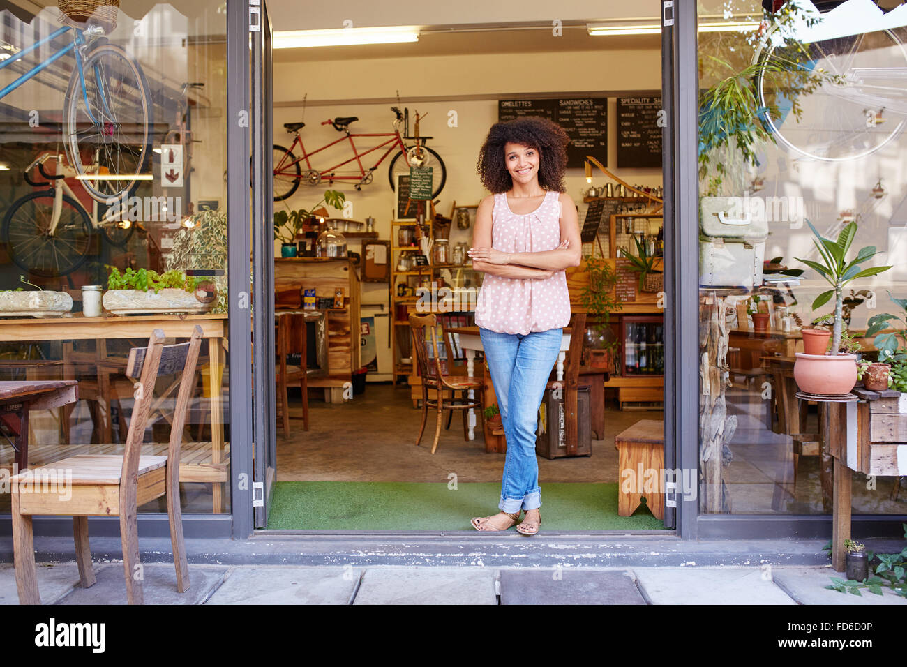Cafe owner standing in entrance hi-res stock photography and images - Alamy