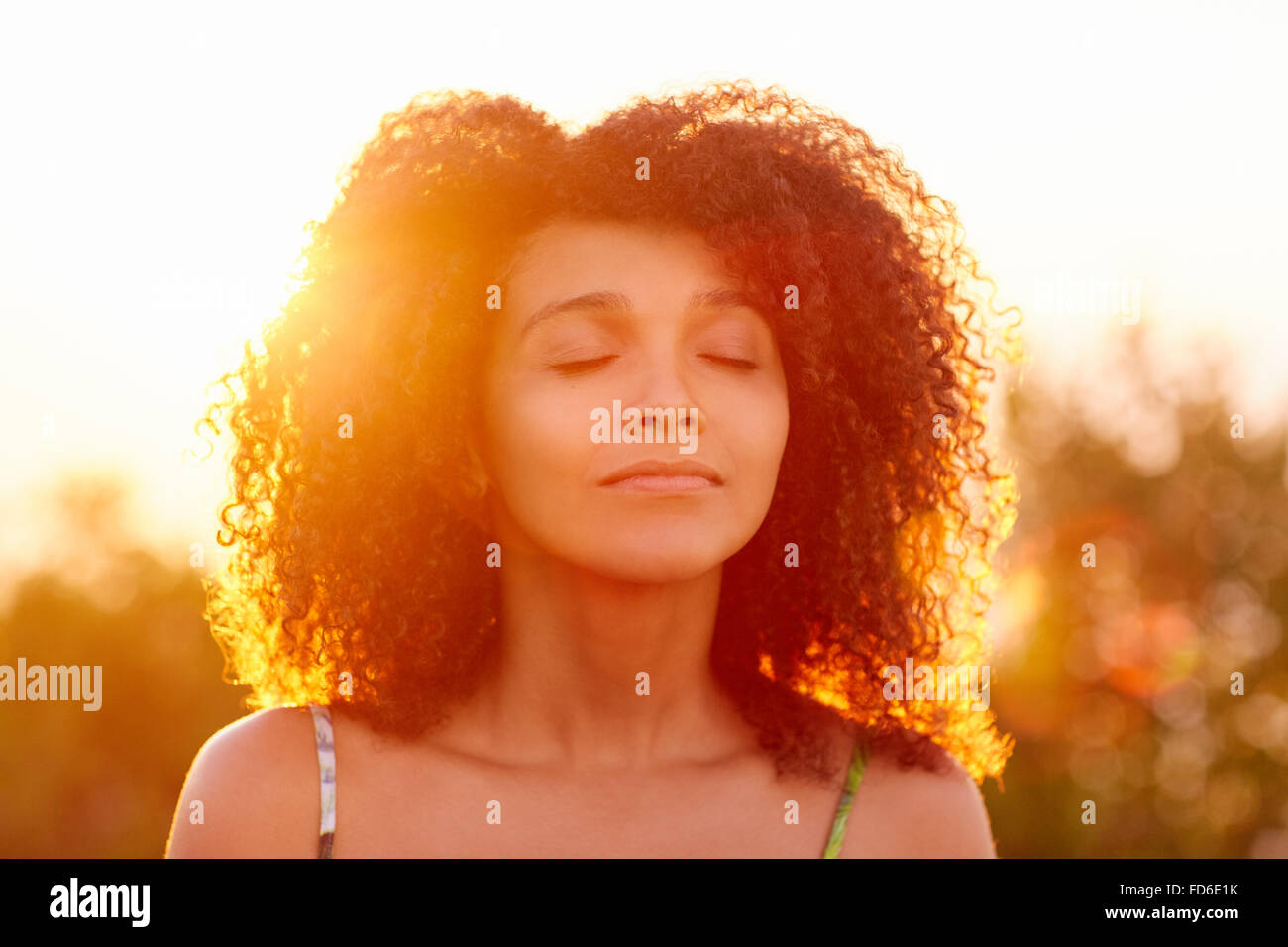 Curly hair woman hi-res stock photography and images - Alamy