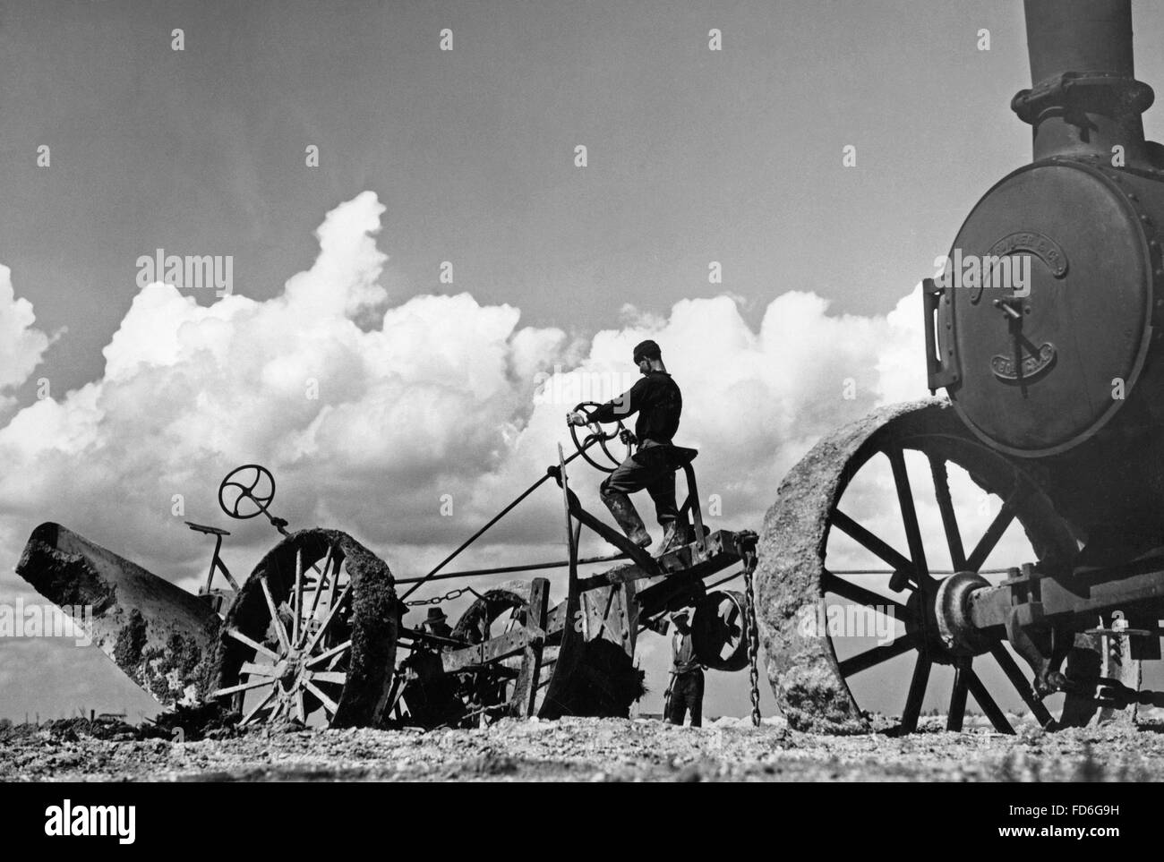 Steam-plow working in the Pontine Marshes (Agro Pontino), 1930s Stock Photo