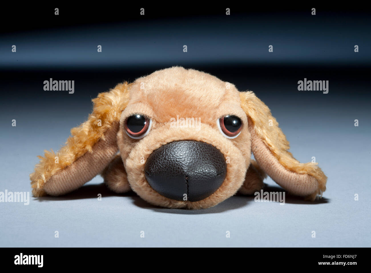 Mcdonalds toy dog on a grey background Stock Photo