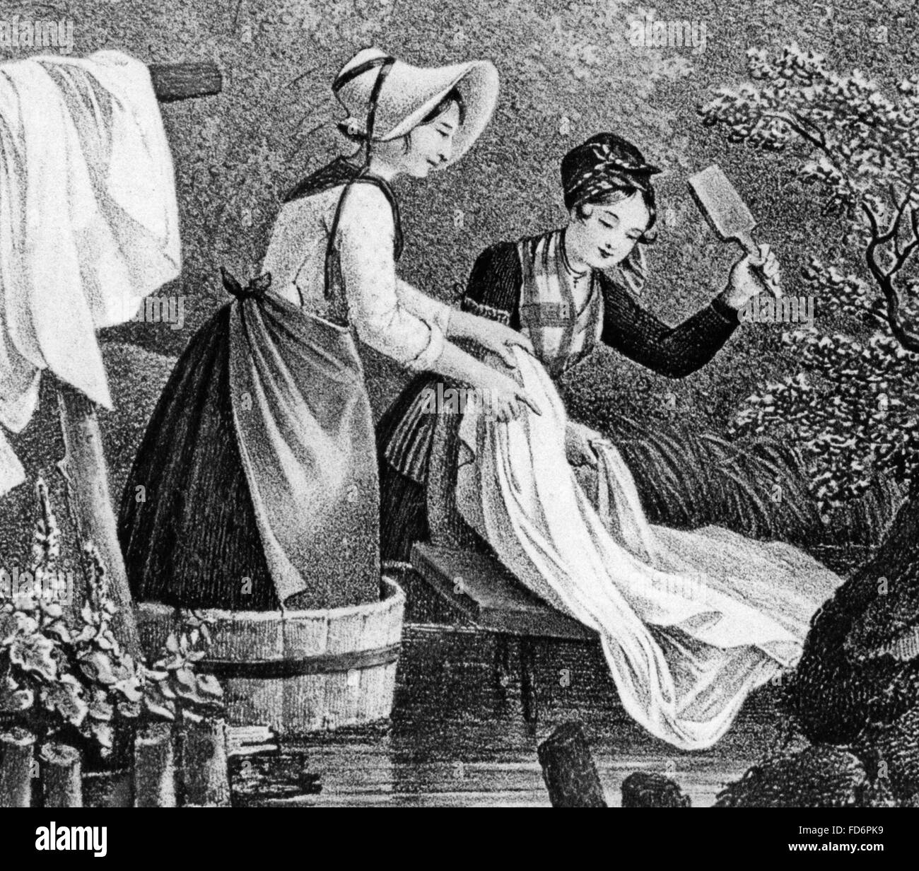 Laundresses in the early 19th century Stock Photo
