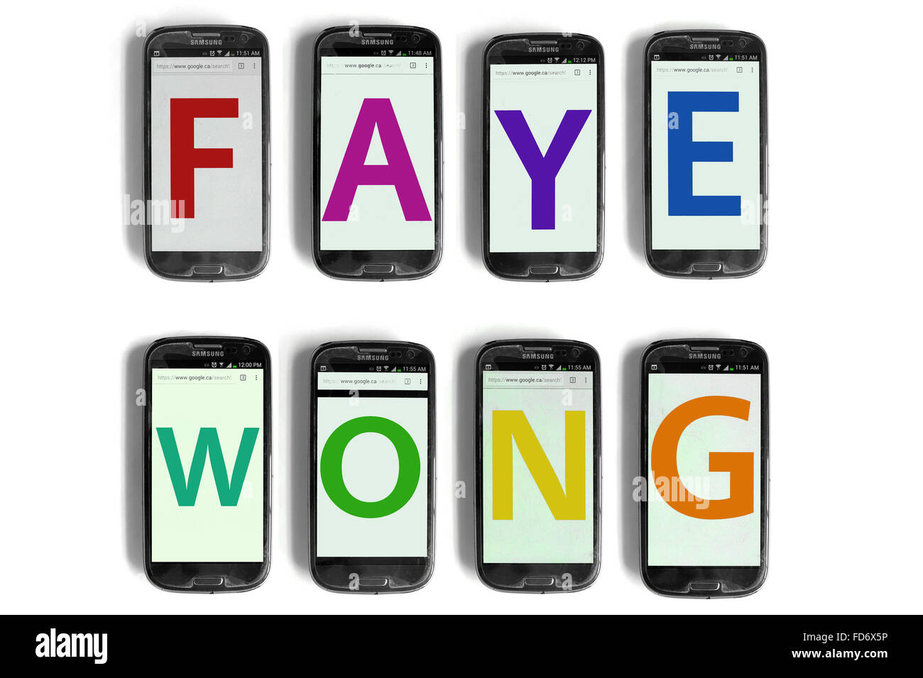 The name of Weibo star Faye Wong spelled out on the screens of smartphones photographed against a white back ground. Stock Photo