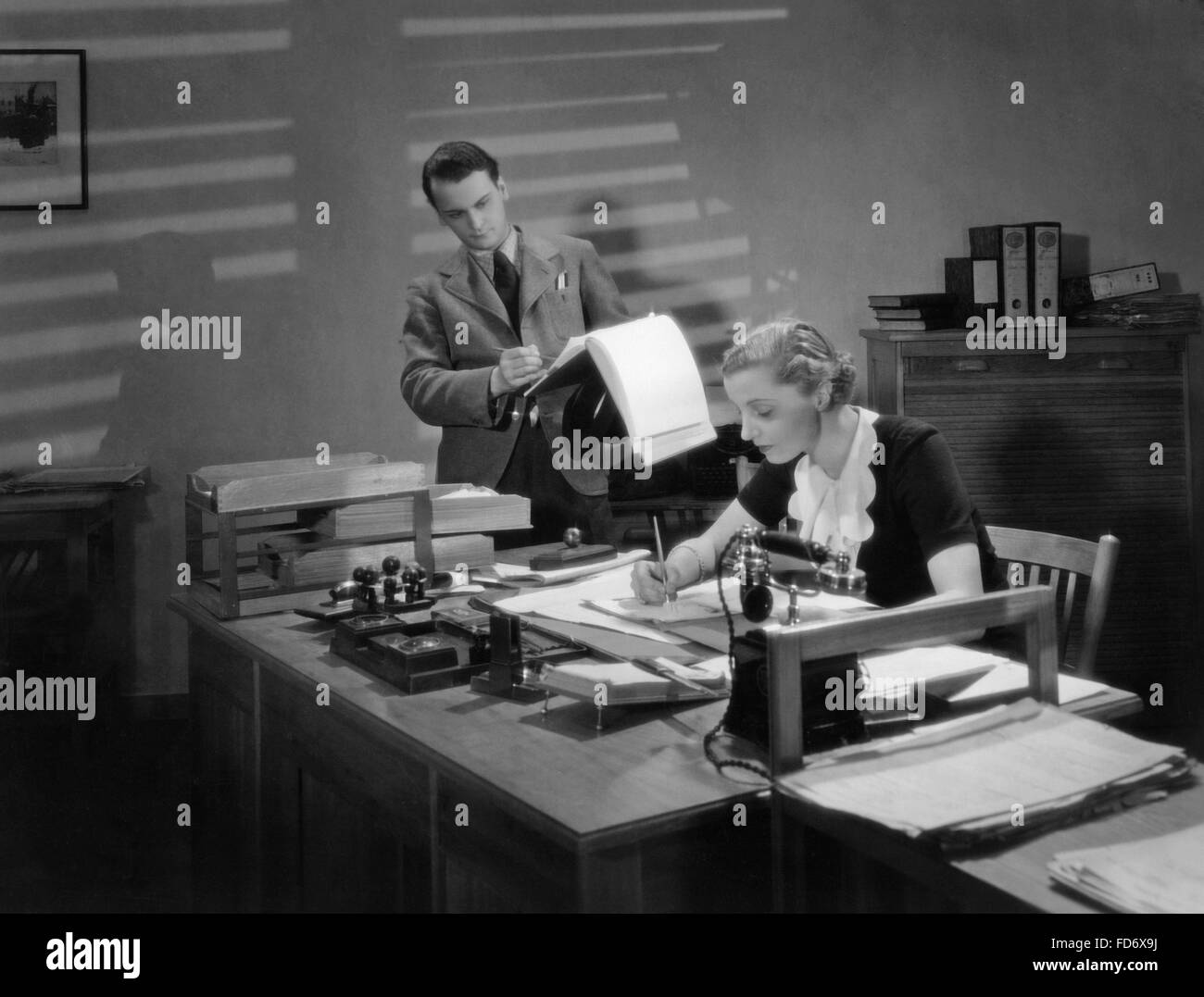 Secretary at the desk, 1936 Stock Photo - Alamy