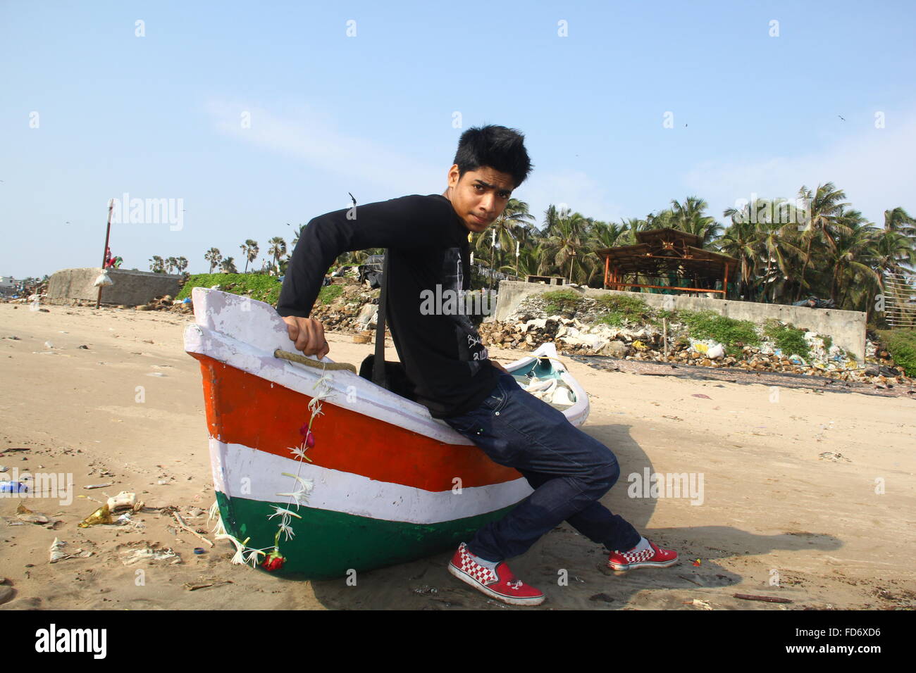 Indian man sitting on boat hi-res stock photography and images - Alamy