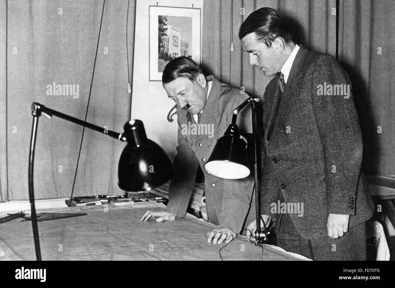Albert Speer and Adolf Hitler examine blueprints, 1937 Stock Photo