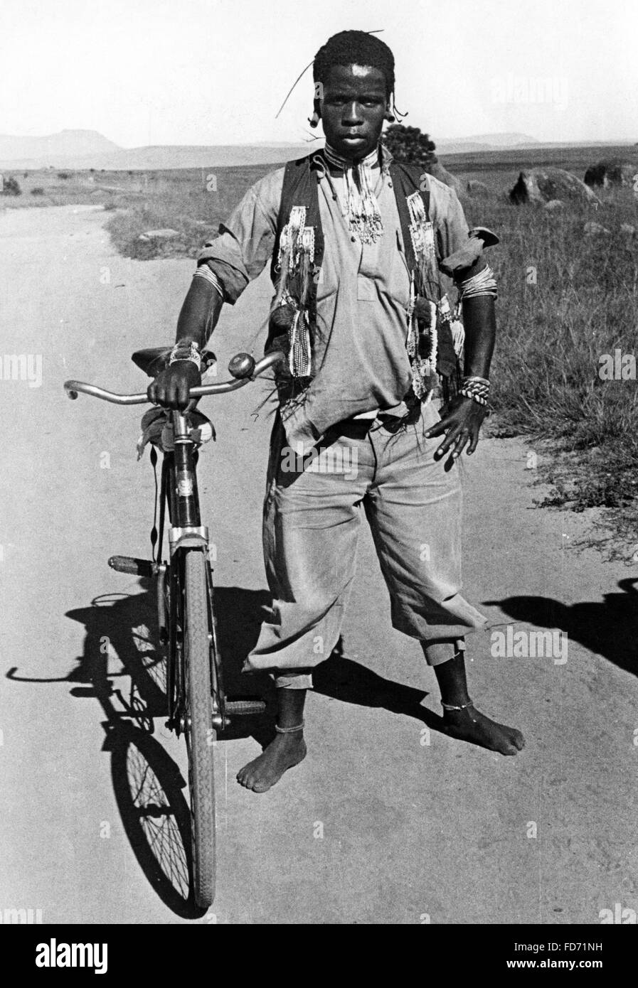 Zulu with a bicycle in South Africa, 1938 Stock Photo