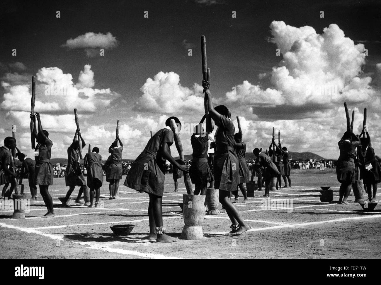 Girls crushing meal in South Africa, 1934 Stock Photo Alamy