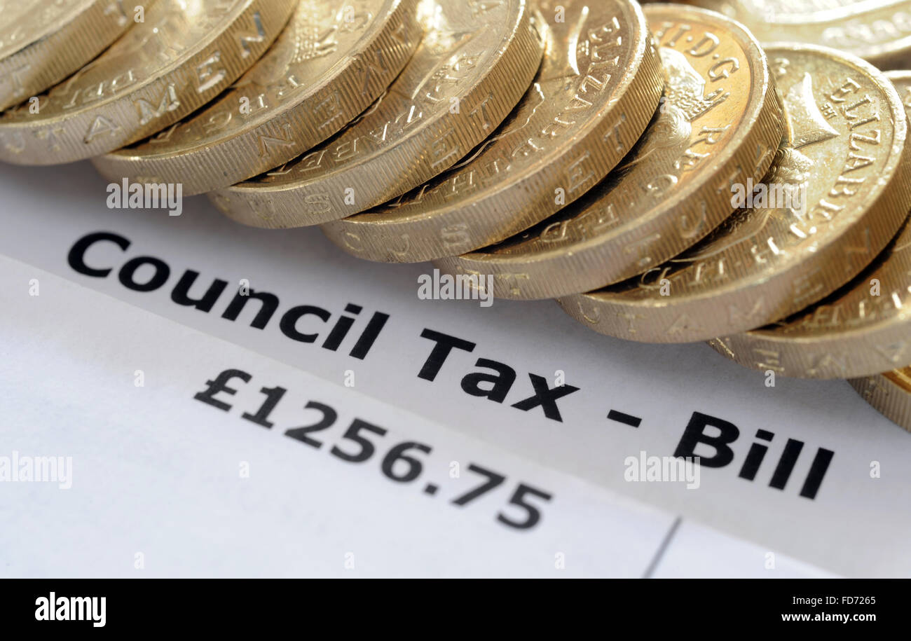 council-tax-bill-with-one-pound-coins-re-household-incomes-bills-budget