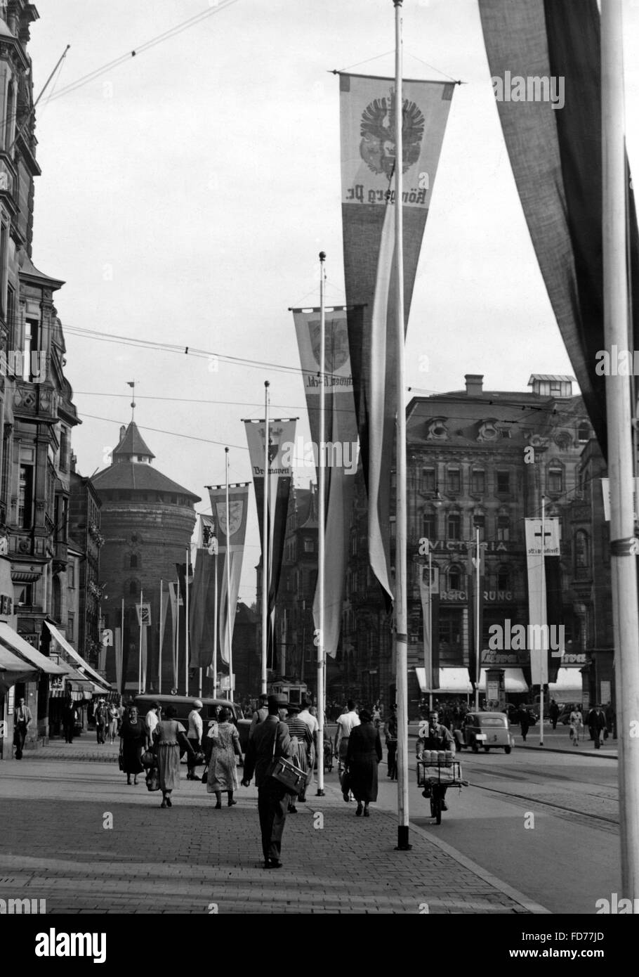 Koenigstrasse with emblem flags in Nuremberg circa 1937 Stock Photo